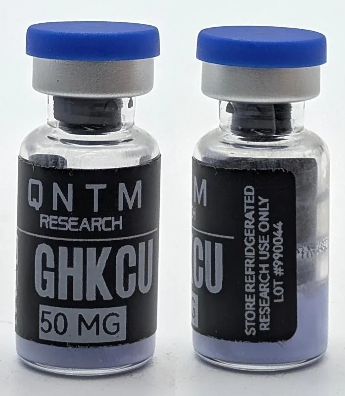 QNTM Research, GHK-Cu 50 mg. Label reads LOT #990044; blue cap.