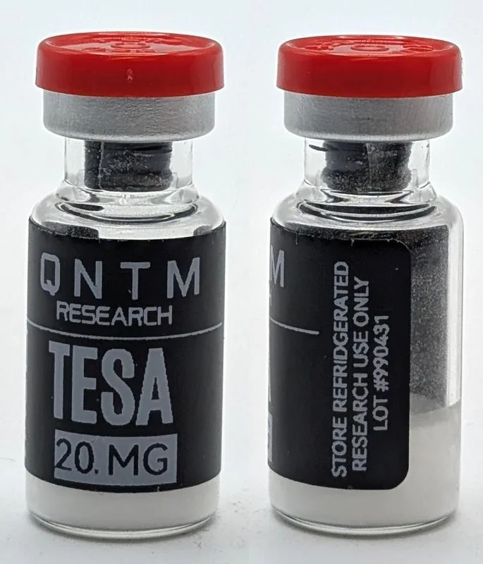 QNTM Research, tesamorelin 20 mg. Label reads LOT #990431; red cap.