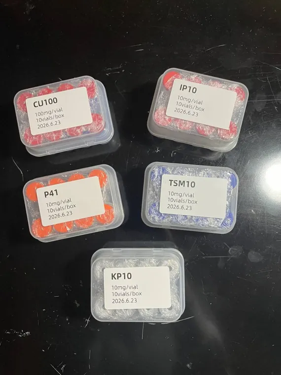 Five boxes of vials with coloured caps, posted with a buyer review of BAOHUA