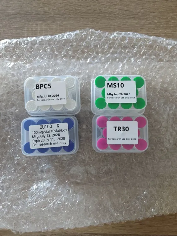 Boxes of vials labelled BPC5, MS10, CU100 and TR30 on bubble wrap, posted with a buyer review of HPT