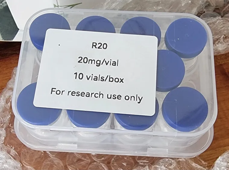 A box of vials labelled R20, 20 mg per vial, posted with a buyer review of BARN